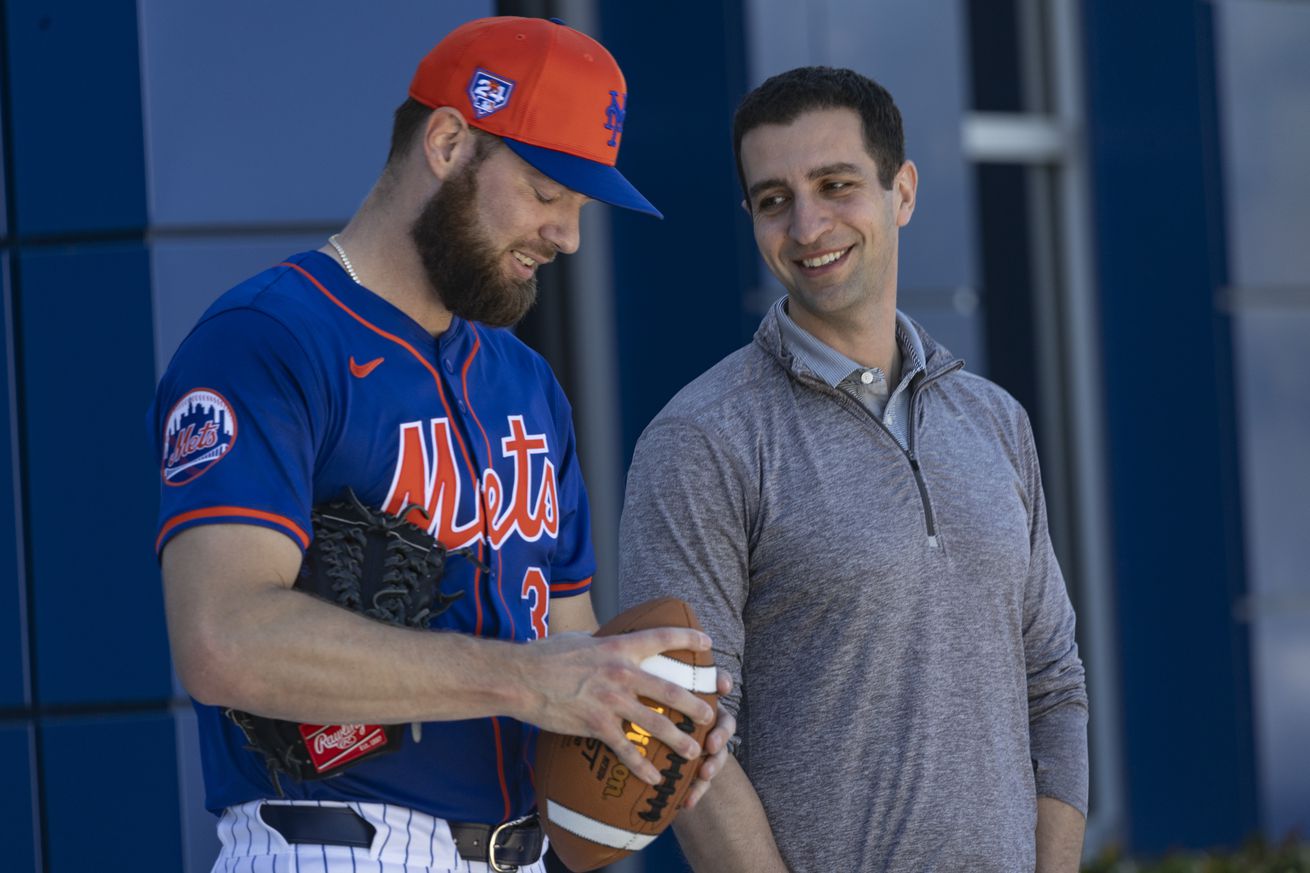 N.Y. Mets President of Baseball Operations David Stearns and pitcher Adrian House talk during team’s spring training workout