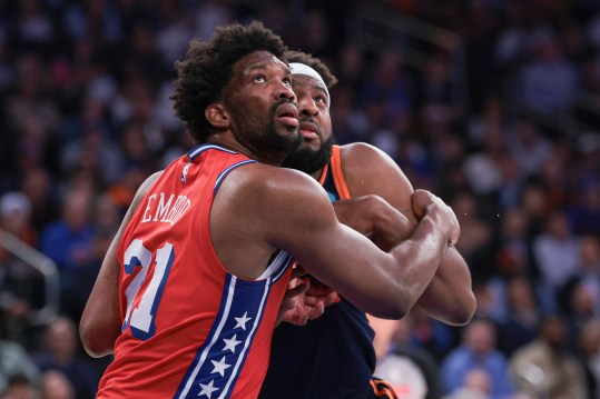 Apr 22, 2024; New York, New York, USA;  Philadelphia 76ers center Joel Embiid (21) battles for position against New York Knicks center Mitchell Robinson (23) during the second half during game two of the first round for the 2024 NBA playoffs at Madison Square Garden. Mandatory Credit: Vincent Carchietta-USA TODAY Sports
