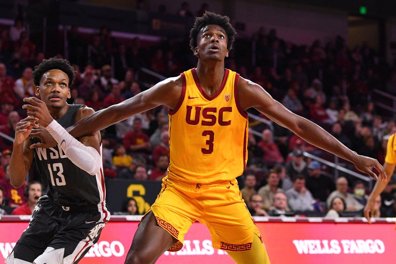 USC forward Vincent Iwuchukwu boxes out Washington State Cougars forward Carlos Rosario during a game on February 2, 2023