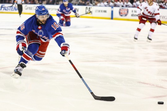 May 5, 2024; New York, New York, USA; New York Rangers center Vincent Trocheck (16) chases the puck in the second period against the Carolina Hurricanes in game one of the second round of the 2024 Stanley Cup Playoffs at Madison Square Garden. Mandatory Credit: Wendell Cruz-USA TODAY Sports
