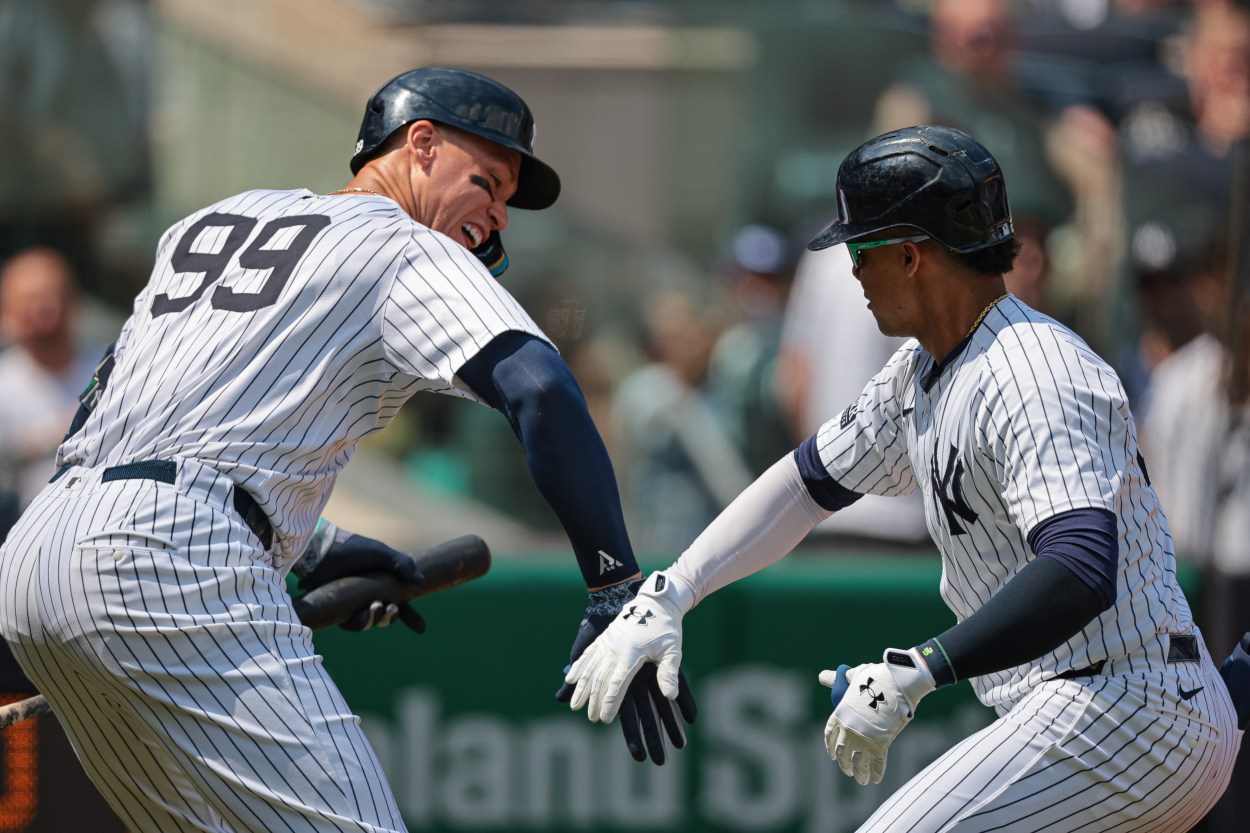 MLB: Texas Rangers at New York Yankees Aug 11, 2024; Bronx, New York, USA; New York Yankees right fielder Juan Soto (22) celebrates with New York Yankees center fielder Aaron Judge (99) after hitting a solo home run during the third inning against the Texas Rangers at Yankee Stadium. Mandatory Credit: Vincent Carchietta-USA TODAY Sports