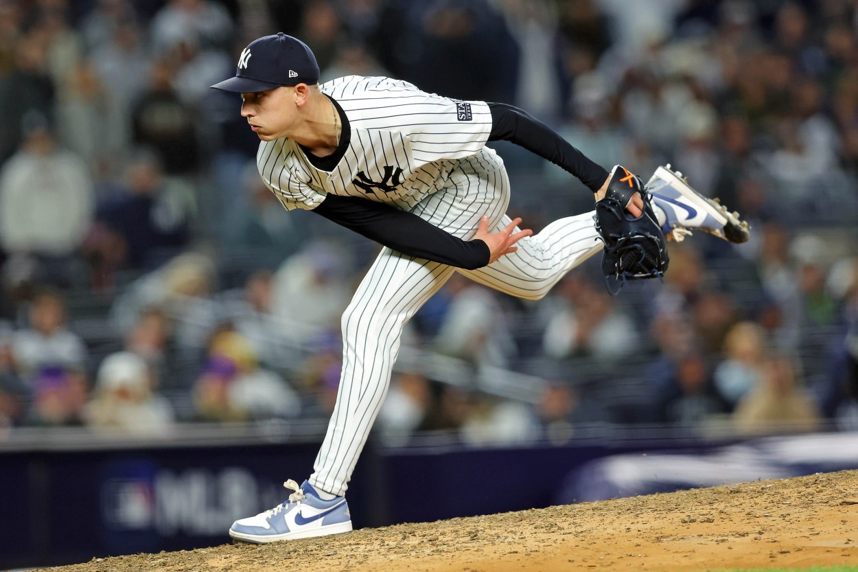 MLB: ALCS-Cleveland Guardians at New York Yankees Oct 14, 2024; Bronx, New York, USA; New York Yankees pitcher Luke Weaver (30) pitches during the eighth inning against the Cleveland Guardians in game one of the ALCS for the 2024 MLB Playoffs at Yankee Stadium. Mandatory Credit: Brad Penner-Imagn Images