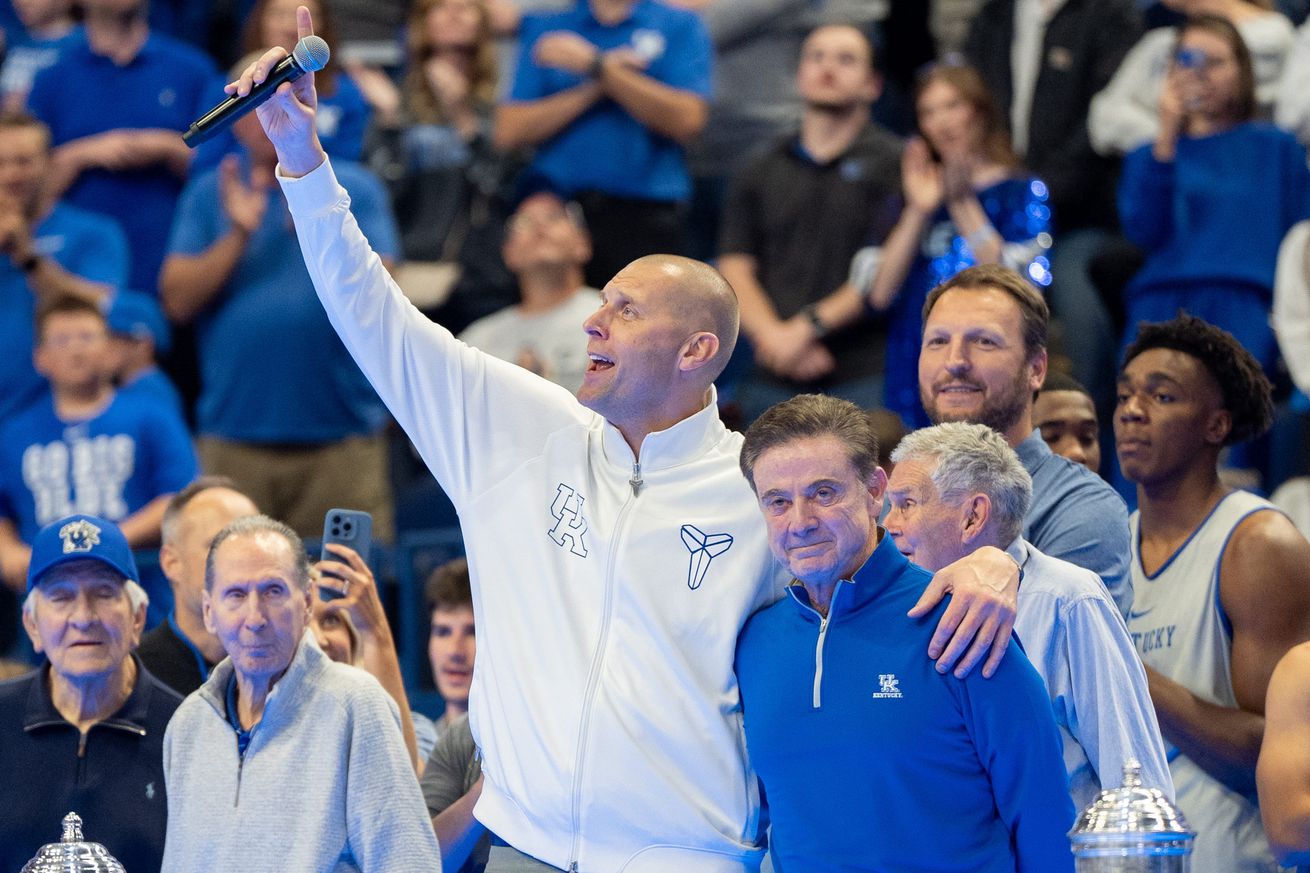 Mark Pope and Rick Pitino celebrate the upcoming basketball season during Big Blue Madness on Friday, Oct. 11, 2024 at Rupp Arena. Syndication: The Courier-Journal