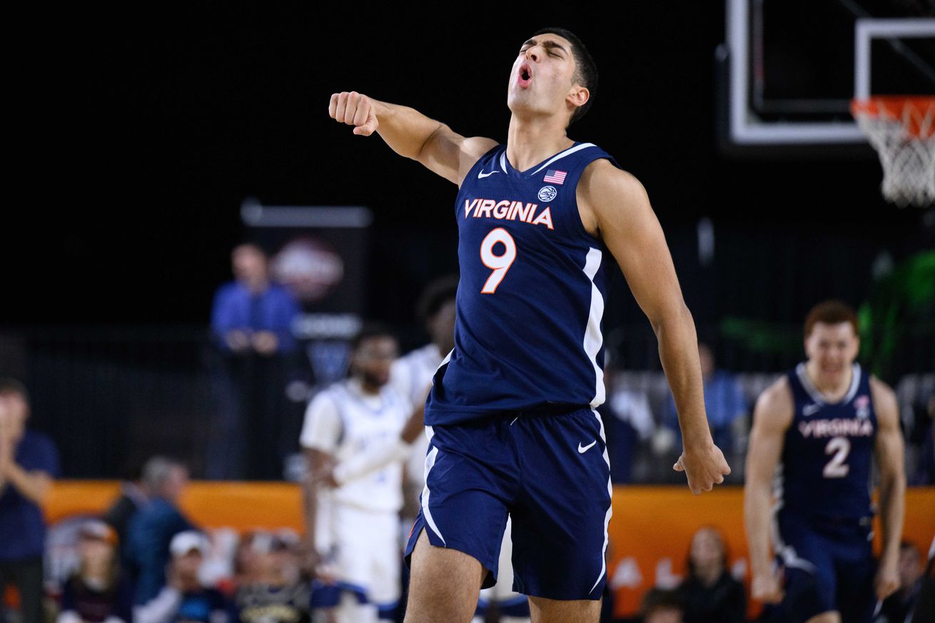 Baltimore, Maryland, USA; Virginia Cavaliers guard Ishan Sharma (9) reacts during the second half against the Villanova Wildcats at CFG Bank Arena. Mandatory Credit: Reggie Hildred-Imagn Images