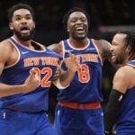 New York Knicks guard Jalen Brunson (11) and forward OG Anunoby, center Karl-Anthony Towns