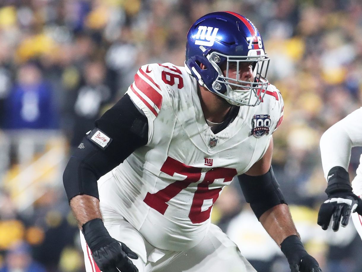 Oct 28, 2024; Pittsburgh, Pennsylvania, USA; New York Giants guard Jon Runyan (76) blocks at the line of scrimmage against the Pittsburgh Steelers during the second quarter at Acrisure Stadium. Mandatory Credit: Charles LeClaire-Imagn Images
