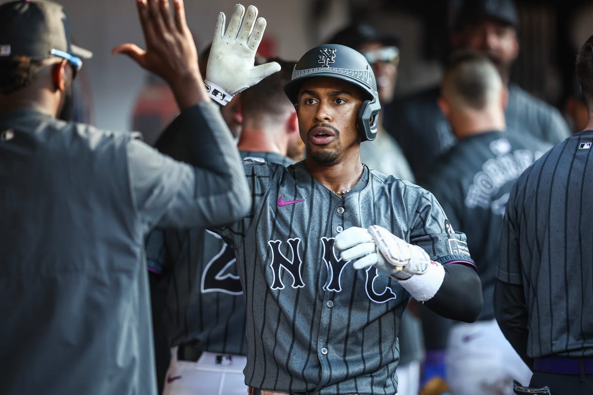 MLB: Colorado Rockies at New York Mets Jul 13, 2024; New York City, New York, USA; New York Mets shortstop Francisco Lindor (12) is greeted in the dugout after hitting a three run home run in the eighth inning against the Colorado Rockies at Citi Field. Mandatory Credit: Wendell Cruz-USA TODAY Sports