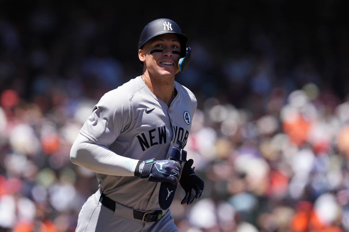 MLB: New York Yankees at San Francisco Giants Jun 2, 2024; San Francisco, California, USA; New York Yankees center fielder Aaron Judge (99) jogs to first base after drawing a walk against the San Francisco Giants during the third inning at Oracle Park. Mandatory Credit: Darren Yamashita-USA TODAY Sports