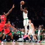 Lonnie Walker IV (Boston Celtics) shoots over the Toronto Raptors defense