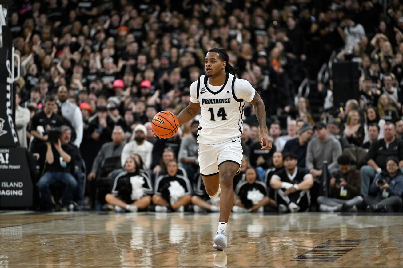 Jan 25, 2025; Providence, Rhode Island, USA; Providence Friars guard Corey Floyd Jr. (14) dribbles the ball down the court during the first half against the Georgetown Hoyas at Amica Mutual Pavilion. Mandatory Credit: Eric Canha-Imagn Images