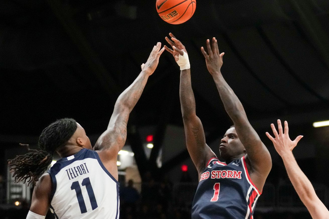Butler Bulldogs forward Jahmyl Telfort (11) guards St. John’s Red Storm guard Kadary Richmond (1) as he shoots the ball during the first half of a game Wednesday, Feb. 26, 2025, at Hinkle Fieldhouse in Indianapolis.