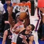 Mar 30, 2025; New York, New York, USA; New York Knicks forward OG Anunoby (8) dunks the ball against Portland Trail Blazers forward Toumani Camara (33) during the second half at Madison Square Garden.