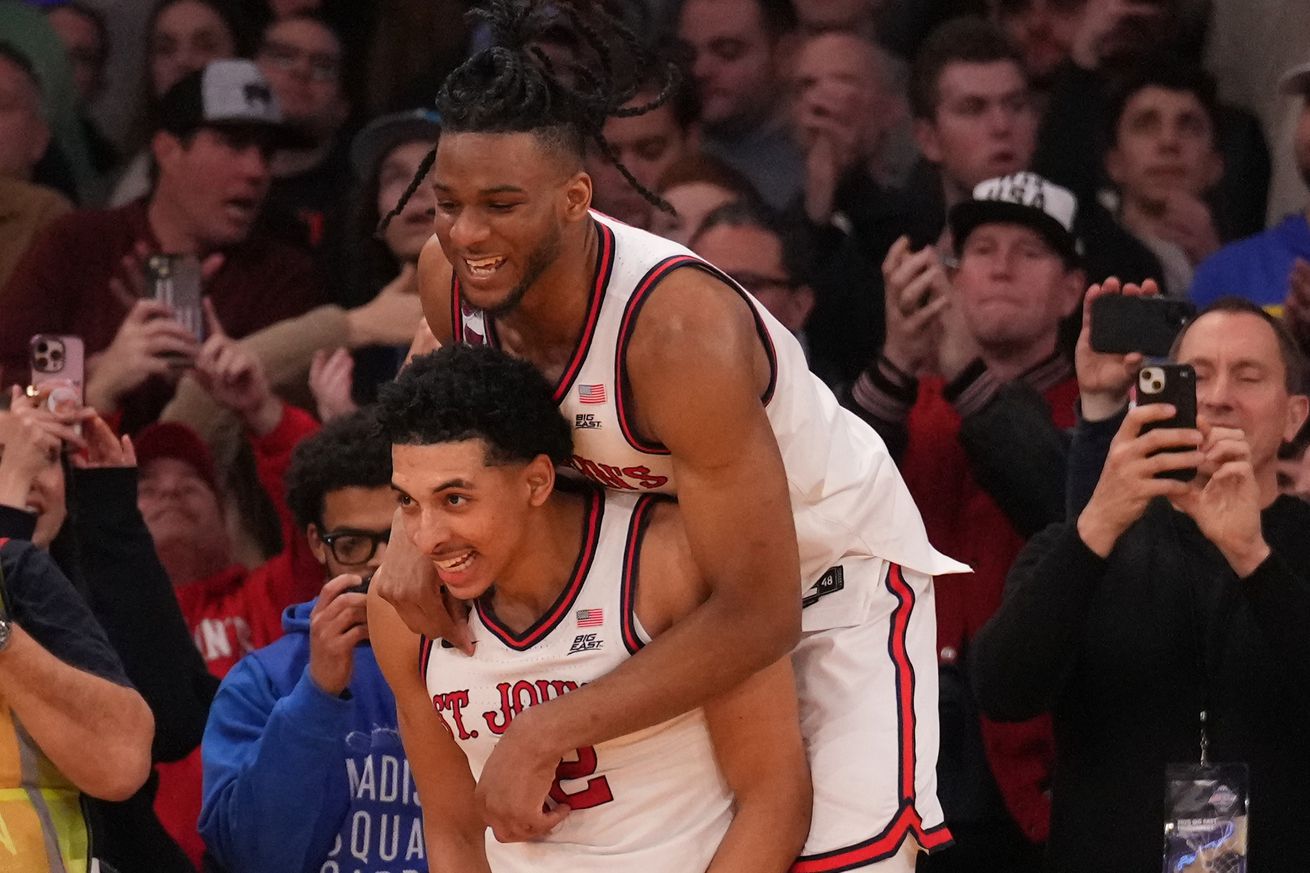 Mar 15, 2025; New York, NY, USA; St. John’s Red Storm guard RJ Luis Jr. (12) and St. John’s Red Storm forward Zuby Ejiofor (24) celebrates the win against the Creighton Bluejays] at Madison Square Garden. Mandatory Credit: Robert Deutsch-Imagn Images