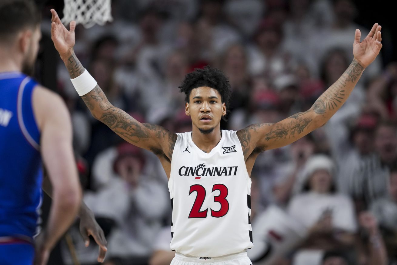 Jan 11, 2025; Cincinnati, Ohio, USA; Cincinnati Bearcats forward Dillon Mitchell (23) reacts to the fans in the game against the Kansas Jayhawks in the first half at Fifth Third Arena. Mandatory Credit: Aaron Doster-Imagn Images