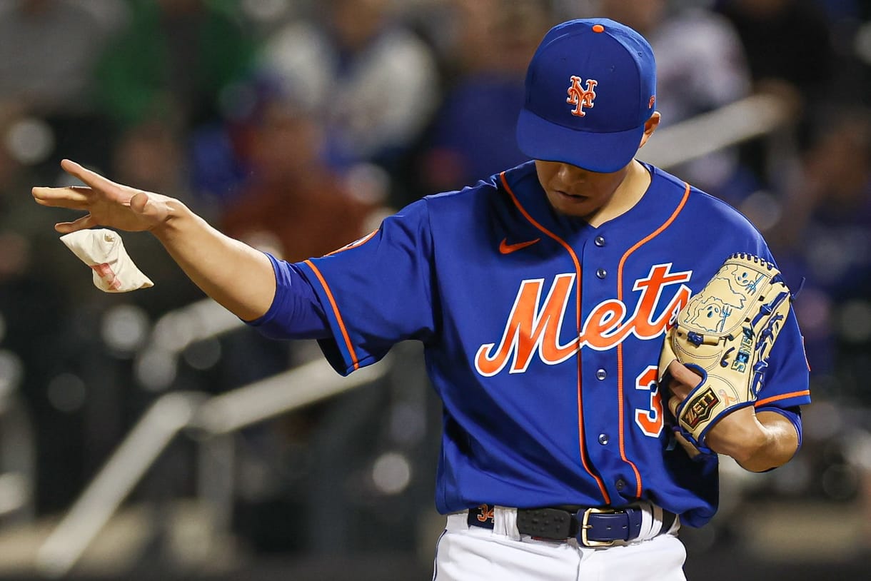 Sep 27, 2023; New York, NY, USA; New York Mets starting pitcher Kodai Senga (34) drops a rosin bag during the fifth inning against the Miami Marlins at Citi Field. Mandatory Credit: Vincent Carchietta-USA TODAY Sports