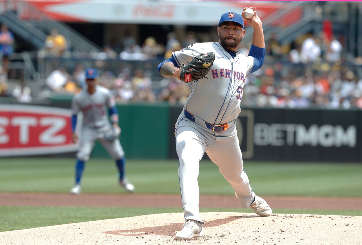 Jul 7, 2024; Pittsburgh, Pennsylvania, USA; New York Mets starting pitcher Sean Manaea (59) delivers a pitch against the Pittsburgh Pirates during the first inning at PNC Park. Mandatory Credit: Charles LeClaire-USA TODAY Sports