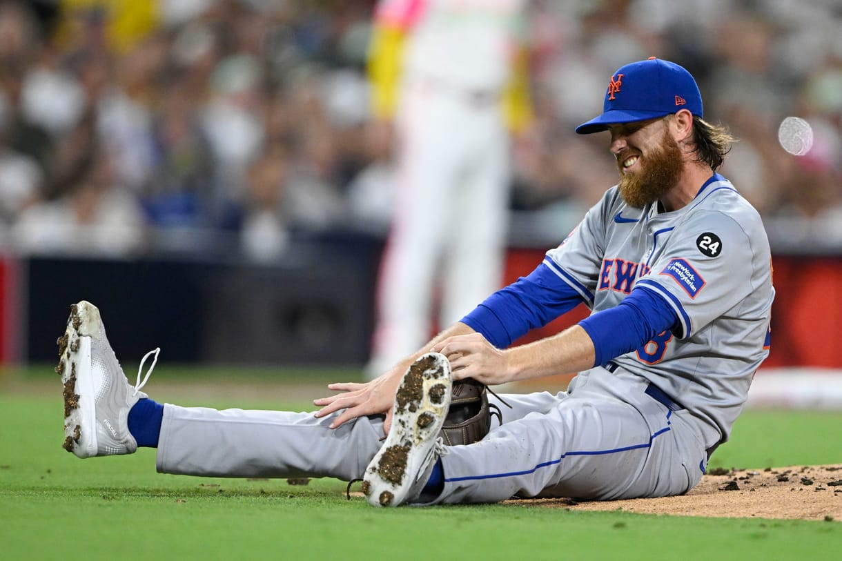 MLB: New York Mets at San Diego Padres Aug 23, 2024; San Diego, California, USA; New York Mets starting pitcher Paul Blackburn (58) reacts after being hit during the third inning against the San Diego Padres at Petco Park. Mandatory Credit: Denis Poroy-USA TODAY Sports