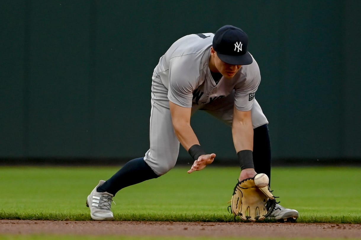 MLB: New York Yankees at Baltimore Orioles May 1, 2024; Baltimore, Maryland, USA; New York Yankees shortstop Anthony Volpe (11) fields a ground ball during the first inning against the Baltimore Orioles at Oriole Park at Camden Yards. Mandatory Credit: Tommy Gilligan-USA TODAY Sports