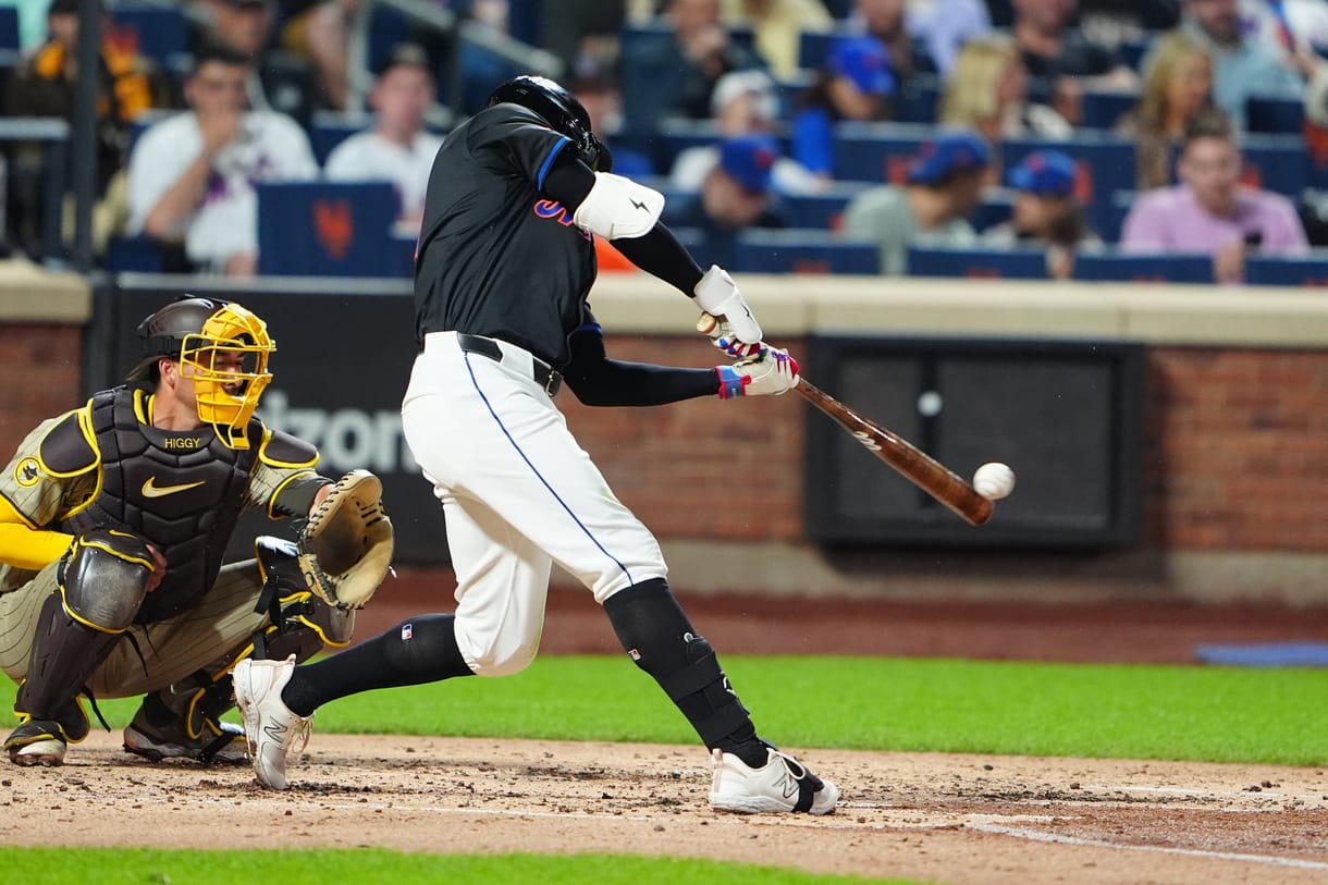 MLB: San Diego Padres at New York Mets Jun 14, 2024; New York City, New York, USA; New York Mets left fielder Brandon Nimmo (9) hits a single against the San Diego Padres during the third inning at Citi Field. Mandatory Credit: Gregory Fisher-USA TODAY Sports