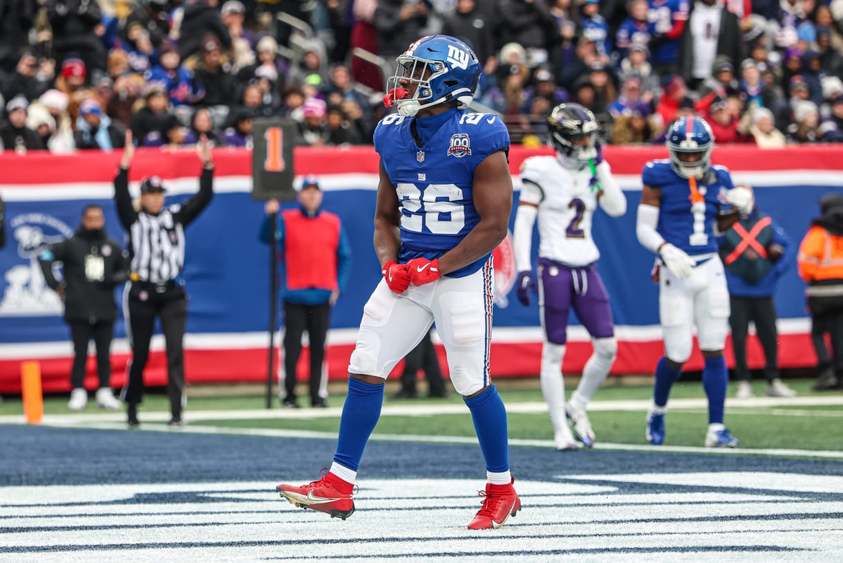 NFL: Baltimore Ravens at New York Giants Dec 15, 2024; East Rutherford, New Jersey, USA; New York Giants running back Devin Singletary (26) celebrates after his rushing touchdown during the first half against the Baltimore Ravens at MetLife Stadium. Mandatory Credit: Vincent Carchietta-Imagn Images