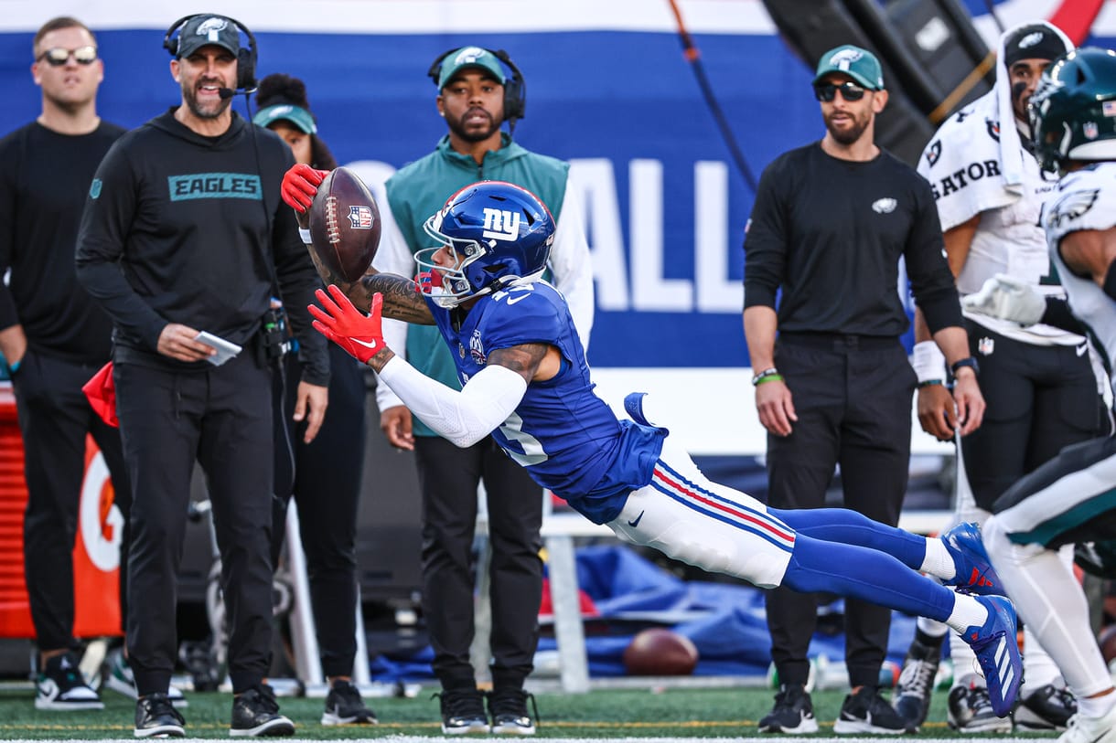 NFL: Philadelphia Eagles at New York Giants Oct 20, 2024; East Rutherford, New Jersey, USA; New York Giants wide receiver Jalin Hyatt (13) attempts to catch a pass in front of Philadelphia Eagles safety Tristin McCollum (36) during the second half at MetLife Stadium. Mandatory Credit: Vincent Carchietta-Imagn Images