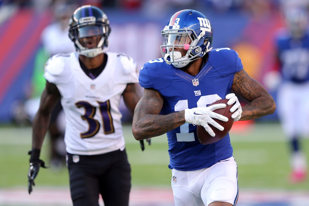 NFL: Baltimore Ravens at New York Giants New York Giants wide receiver Odell Beckham Jr. (13) runs for a touchdown against Baltimore Ravens corner back Will Davis (31) during the fourth quarter at MetLife Stadium