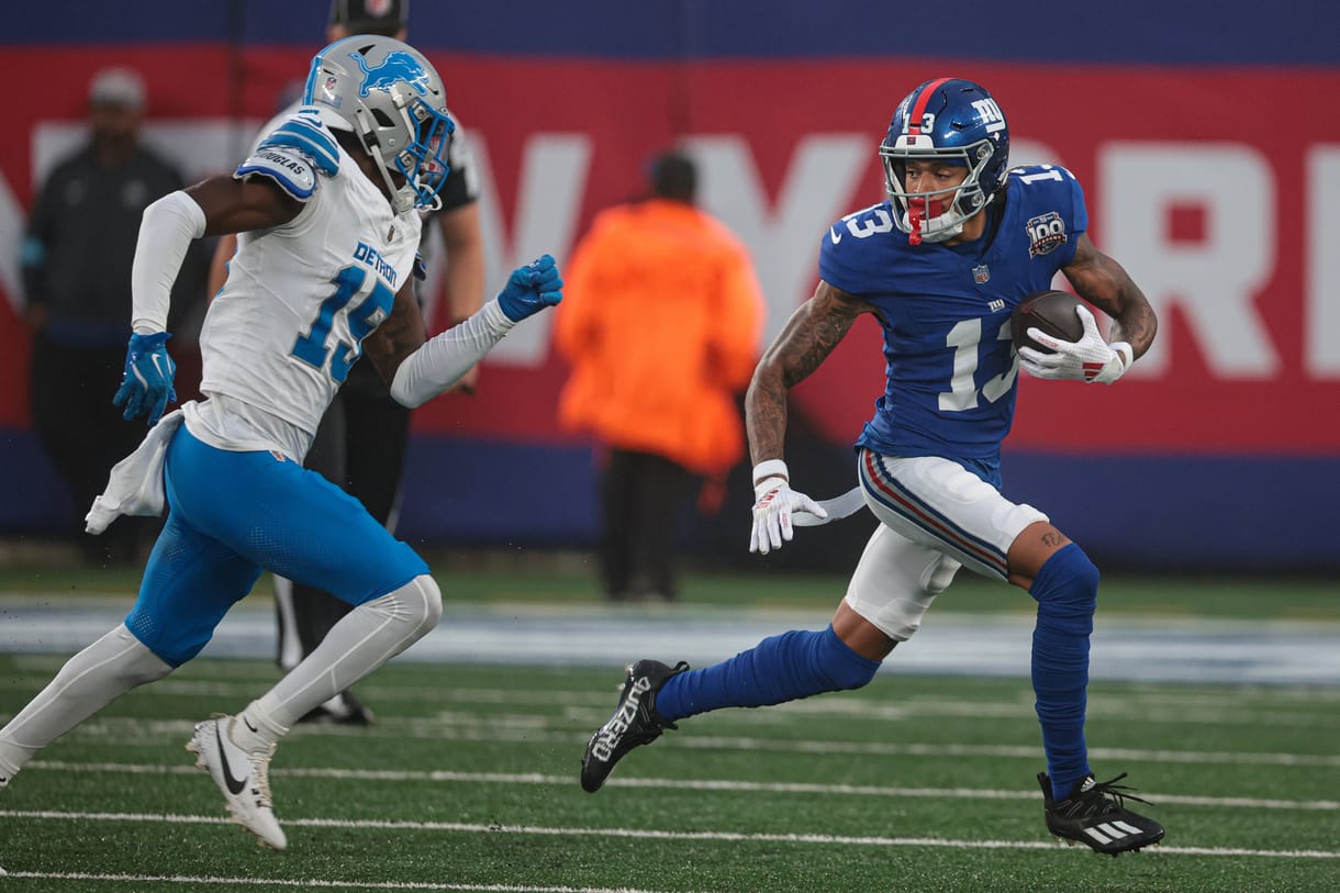 NFL: Detroit Lions at New York Giants Aug 8, 2024; East Rutherford, New Jersey, USA; New York Giants wide receiver Jalin Hyatt (13) gains yards after catch as Detroit Lions cornerback Ennis Rakestraw Jr. (15) pursues at MetLife Stadium. Mandatory Credit: Vincent Carchietta-USA TODAY Sports