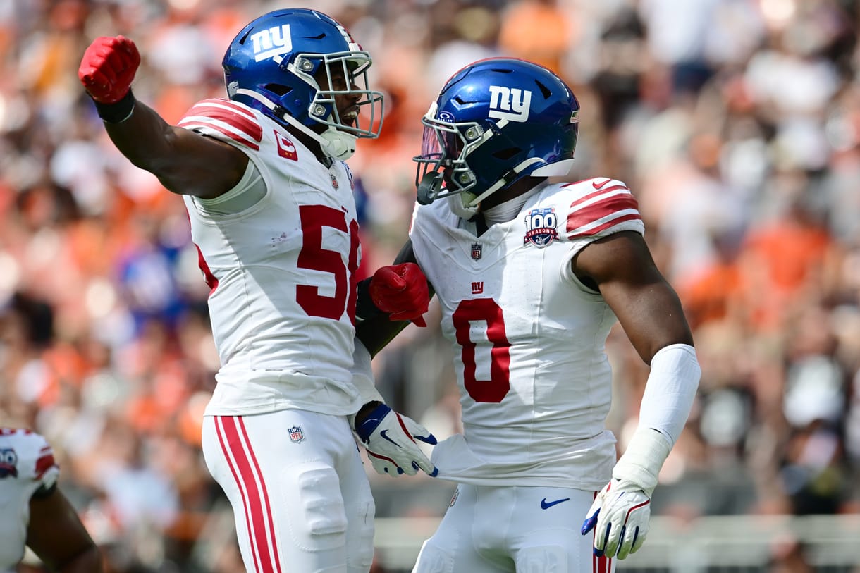 NFL: New York Giants at Cleveland Browns Sep 22, 2024; Cleveland, Ohio, USA; New York Giants linebacker Bobby Okereke (58) and linebacker Brian Burns (0) celebrate after Burns strip sacked Cleveland Browns quarterback Deshaun Watson (not pictured) during the first half at Huntington Bank Field. Mandatory Credit: Ken Blaze-Imagn Images