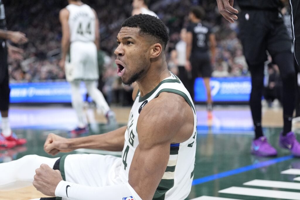 Milwaukee Bucks forward Giannis Antetokounmpo (34) reacts after being fouled driving to the basket against the Brooklyn Nets in the first halfat Fiserv Forum.