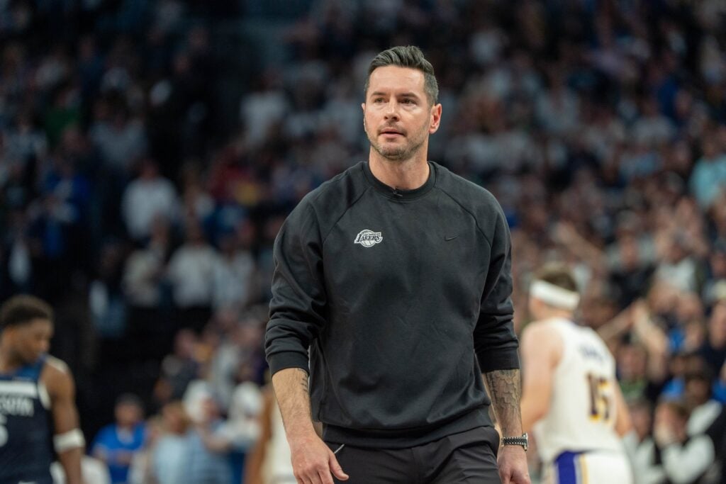 Apr 27, 2025; Minneapolis, Minnesota, USA; Los Angeles Lakers head coach JJ Redick reacts to his team losing the lead to the Minnesota Timberwolves late in the fourth quarter during game four of first round for the 2025 NBA Playoffs at Target Center. Mandatory Credit: Matt Blewett-Imagn Images