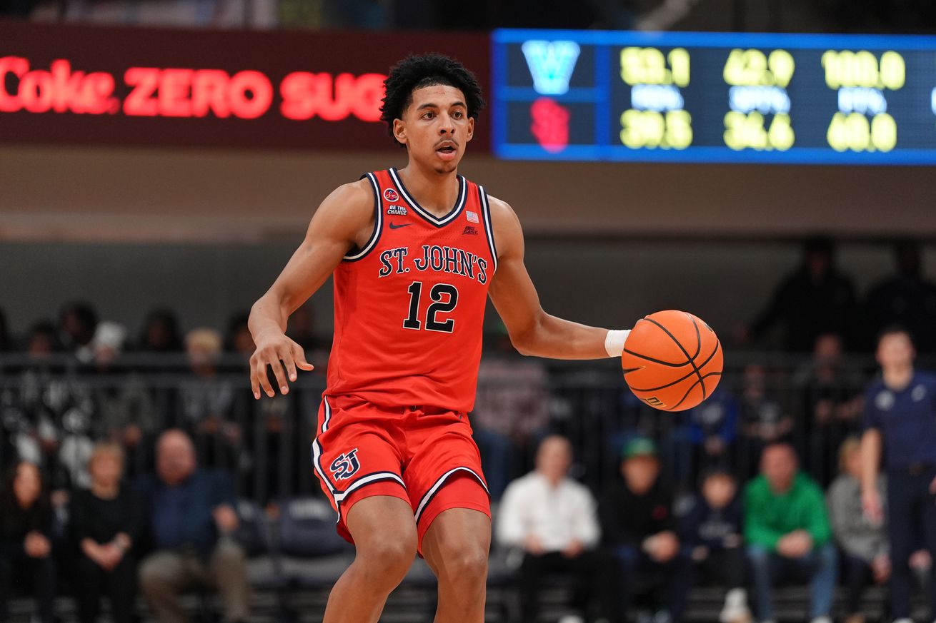 Feb 12, 2025; Villanova, Pennsylvania, USA; Saint John’s Red Storm guard RJ Luis Jr (12) controls the ball against the Villanova Wildcats in the second half at William B. Finneran Pavilion. Mandatory Credit: Kyle Ross-Imagn Images