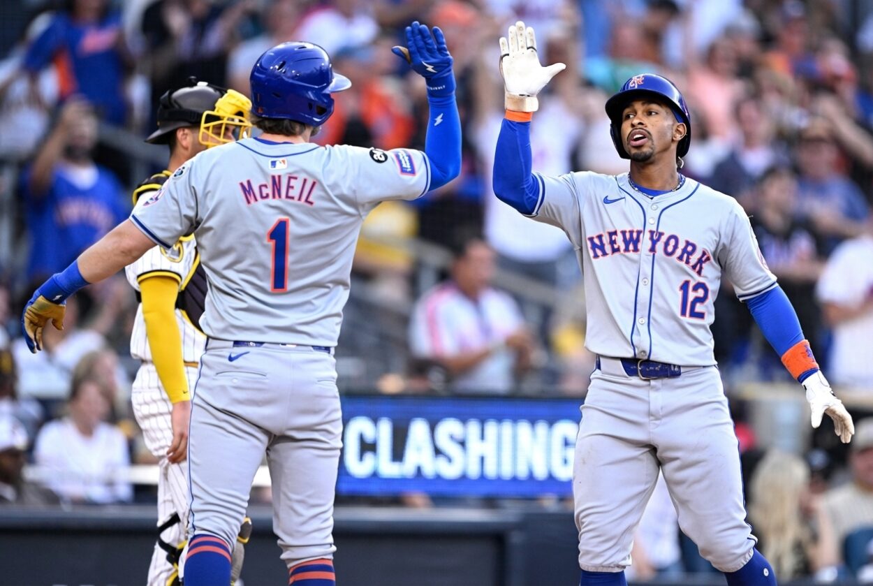 Aug 24, 2024; San Diego, California, USA; New York Mets shortstop Francisco Lindor (12) is congratulated by second baseman Jeff McNeil (1) after hitting a grand slam home run against the San Diego Padres during the fourth inning at Petco Park. Mandatory Credit: Orlando Ramirez-USA TODAY Sports Aug 24, 2024; San Diego, California, USA; New York Mets shortstop Francisco Lindor (12) is congratulated by second baseman Jeff McNeil (1) after hitting a grand slam home run against the San Diego Padres during the fourth inning at Petco Park. Mandatory Credit: Orlando Ramirez-USA TODAY Sports