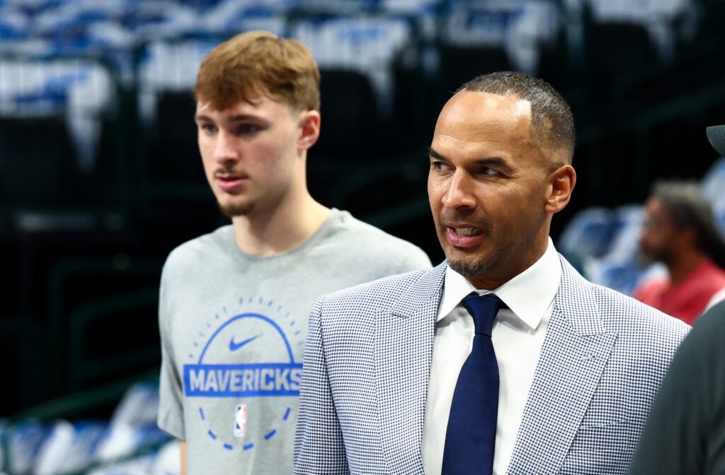 Oct 22, 2025; Dallas, Texas, USA; Dallas Mavericks general manager Nico Harrison and Dallas Mavericks forward Cooper Flagg (32) before the game against the San Antonio Spurs at American Airlines Center. Mandatory Credit: Kevin Jairaj-Imagn Images