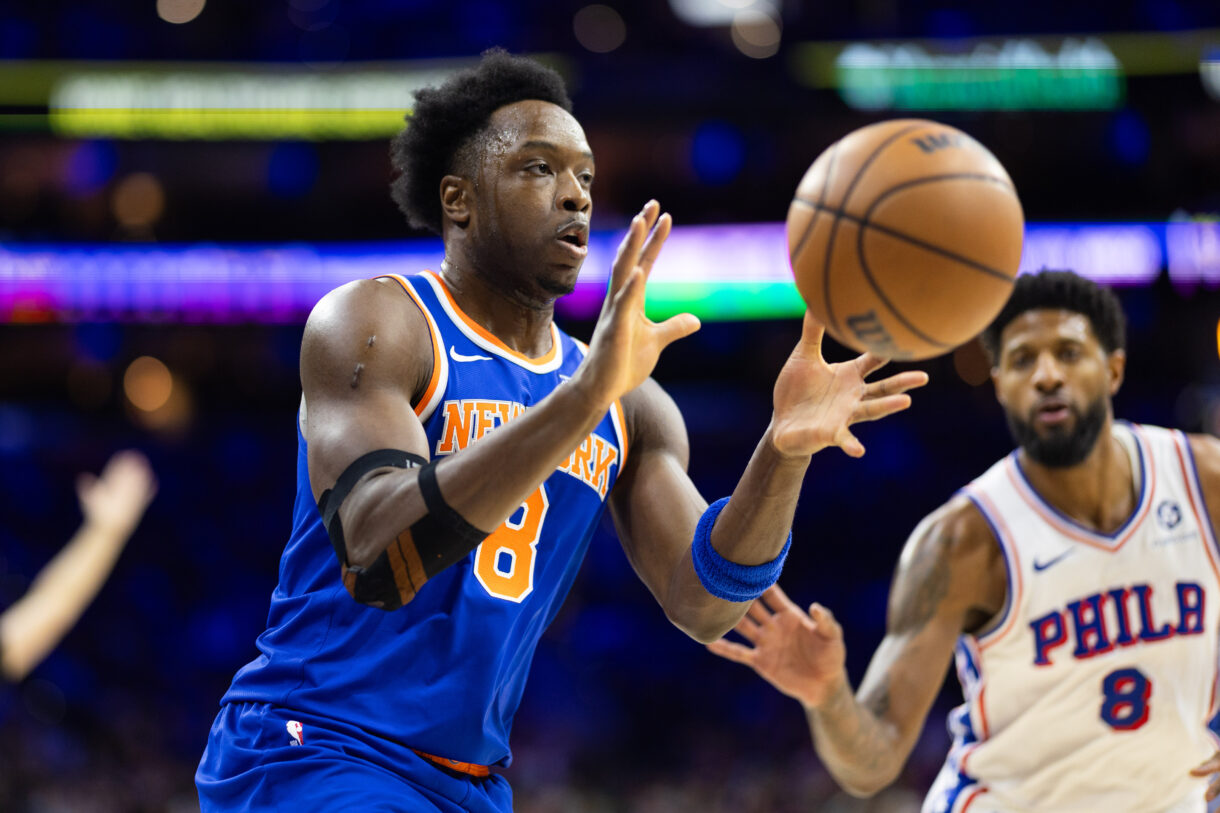 NBA: New York Knicks at Philadelphia 76ers Jan 15, 2025; Philadelphia, Pennsylvania, USA; New York Knicks forward OG Anunoby (8) catches a pass in front of Philadelphia 76ers forward Paul George (8) during the first quarter at Wells Fargo Center. Mandatory Credit: Bill Streicher-Imagn Images